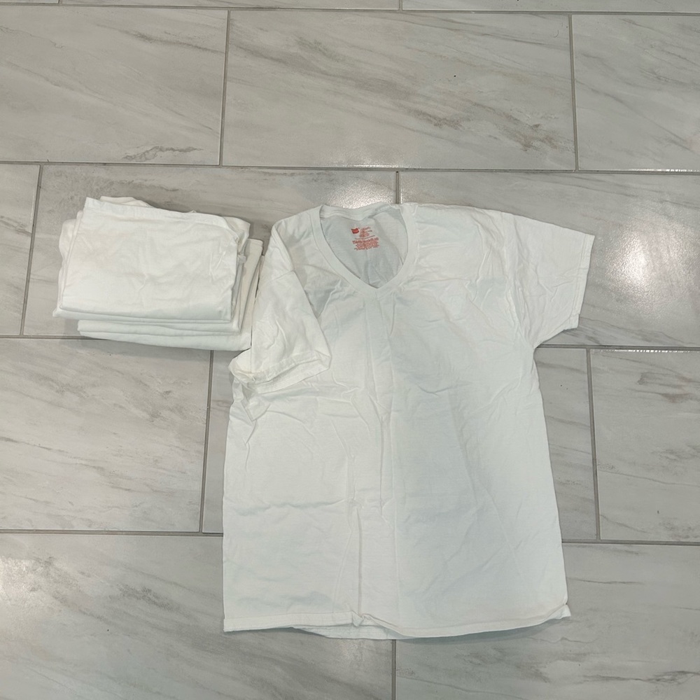 Hanes large white undershirt. Never worn 6 altogether